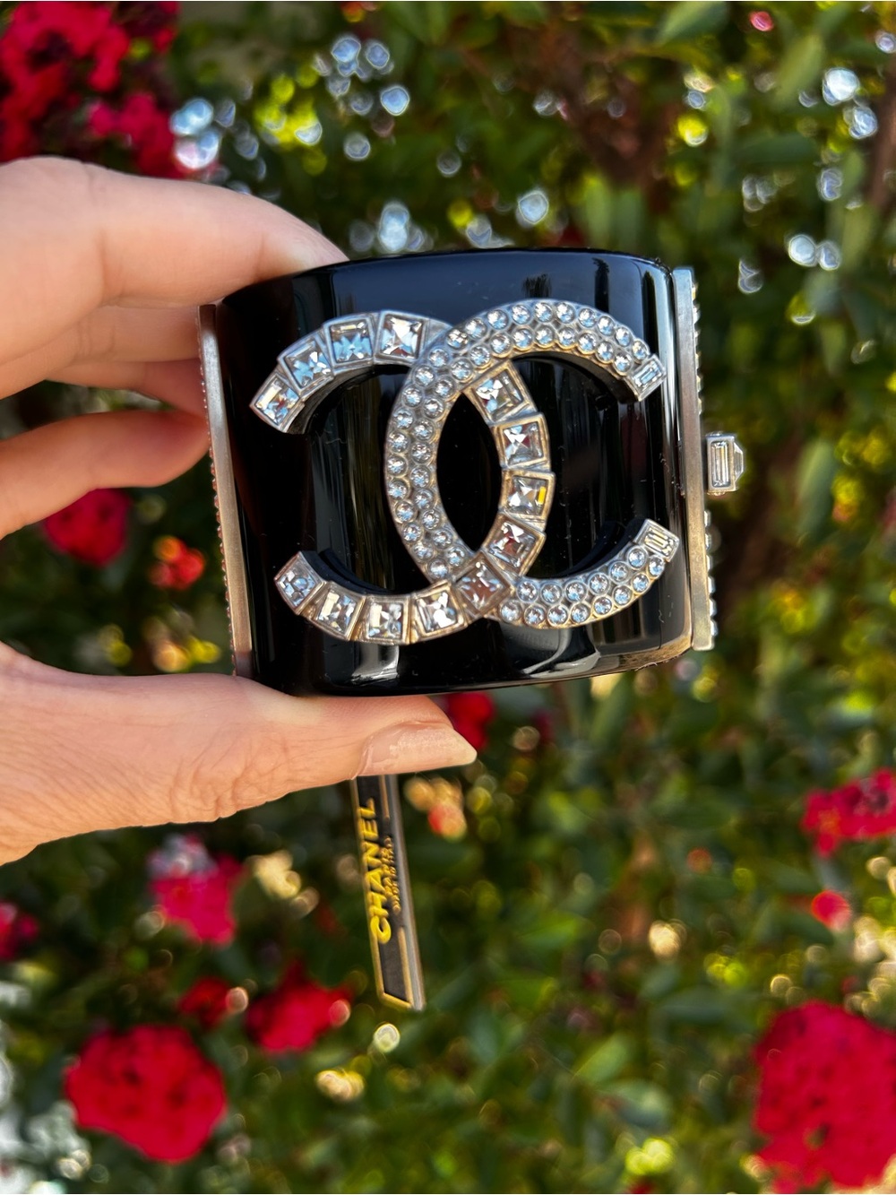 CHANEL Black Resin Cuff Bracelet with Crystal CC Emblem